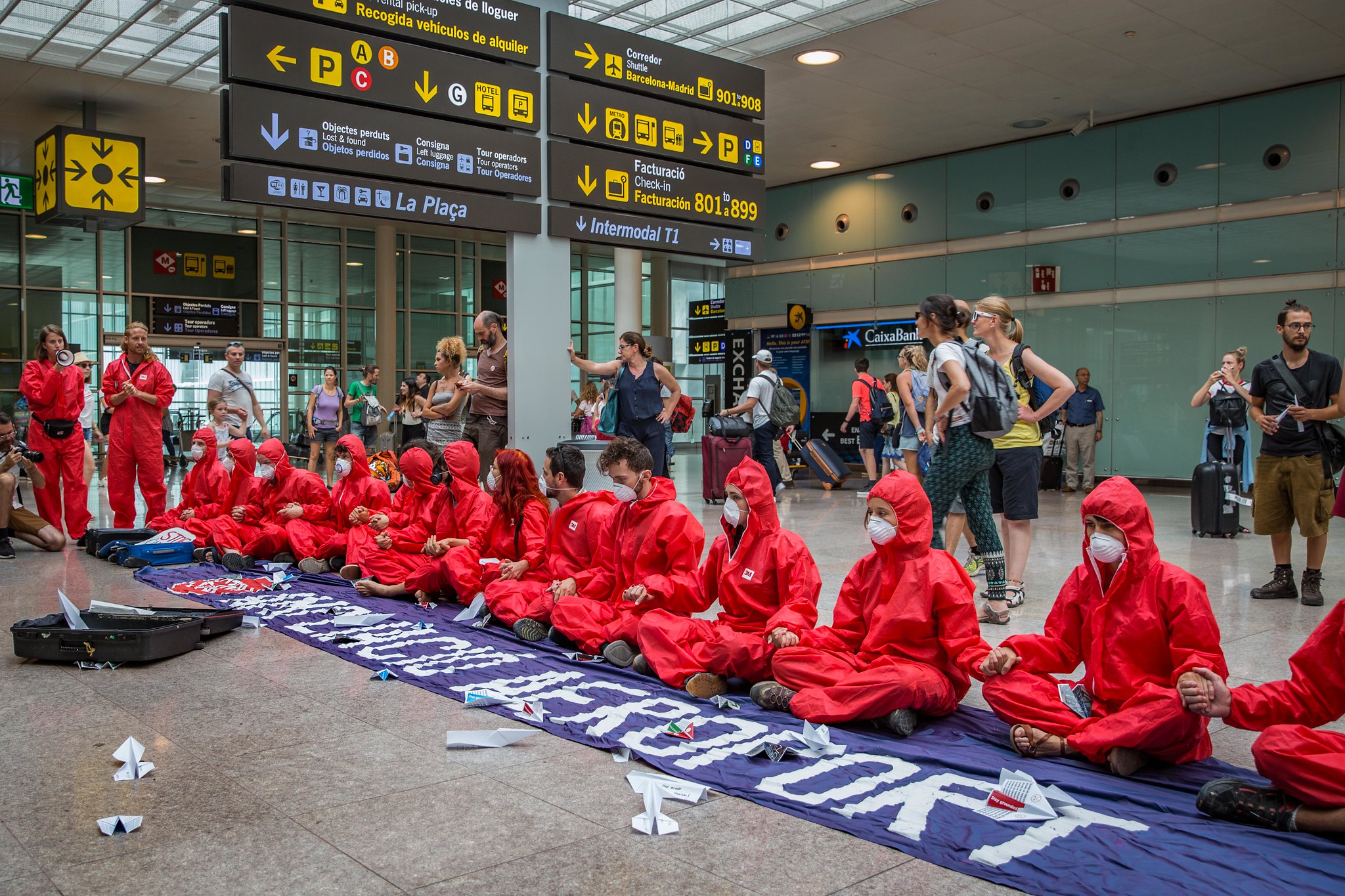 Red line action at Barcelona Airport by activists